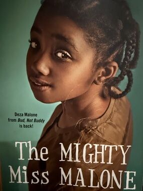 The Mighty Miss Malone - Teal Cover with Brown Jacket